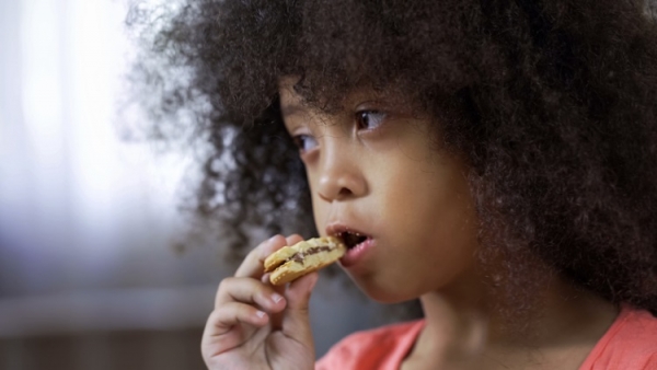 Black girl eating a cookie Motortion