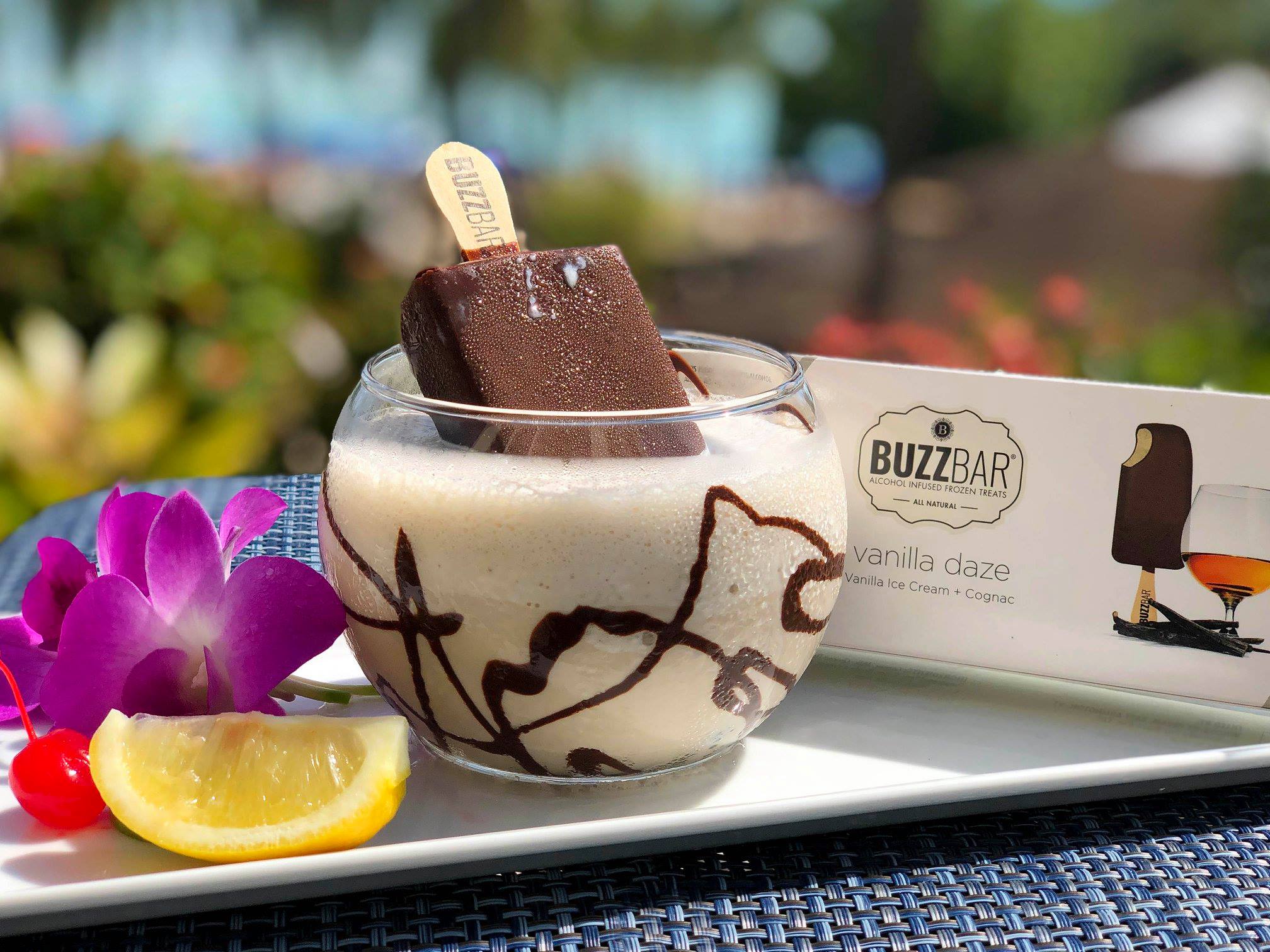 ice cream popsicle dipped in a cocktail glass