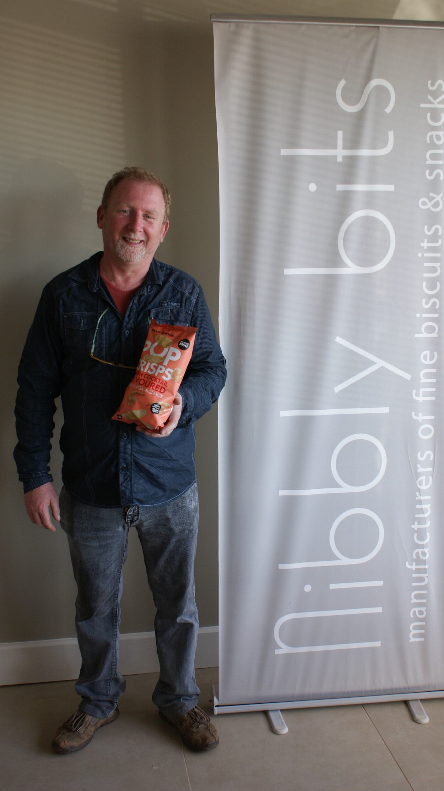 ish2016.162-Nibbly-Bits-smiling-customer-with-finish-product-NL-shot-LR.jpg