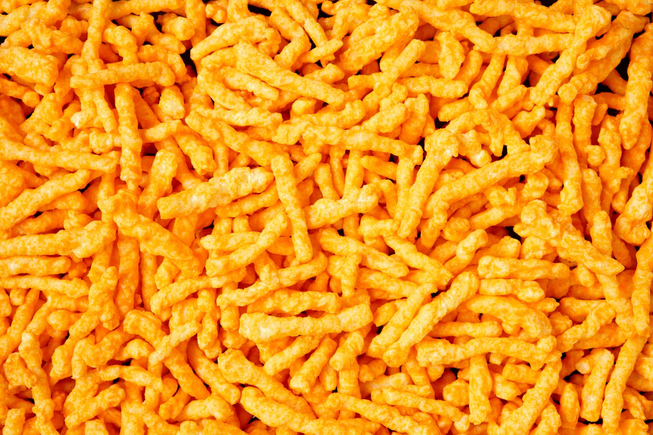 Cheese flavoured puffed snacks