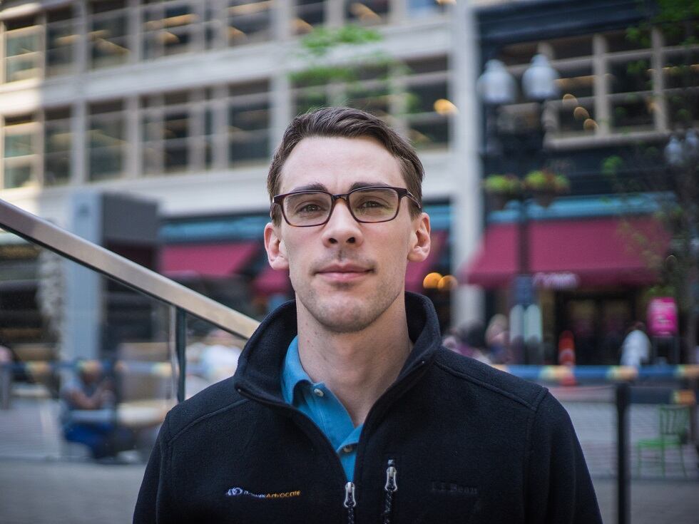 Founder-Headshot-City-Background.jpg