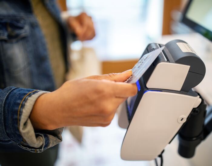 GettyImages-Louis-Alvarez-checkout-supermarket-money.png