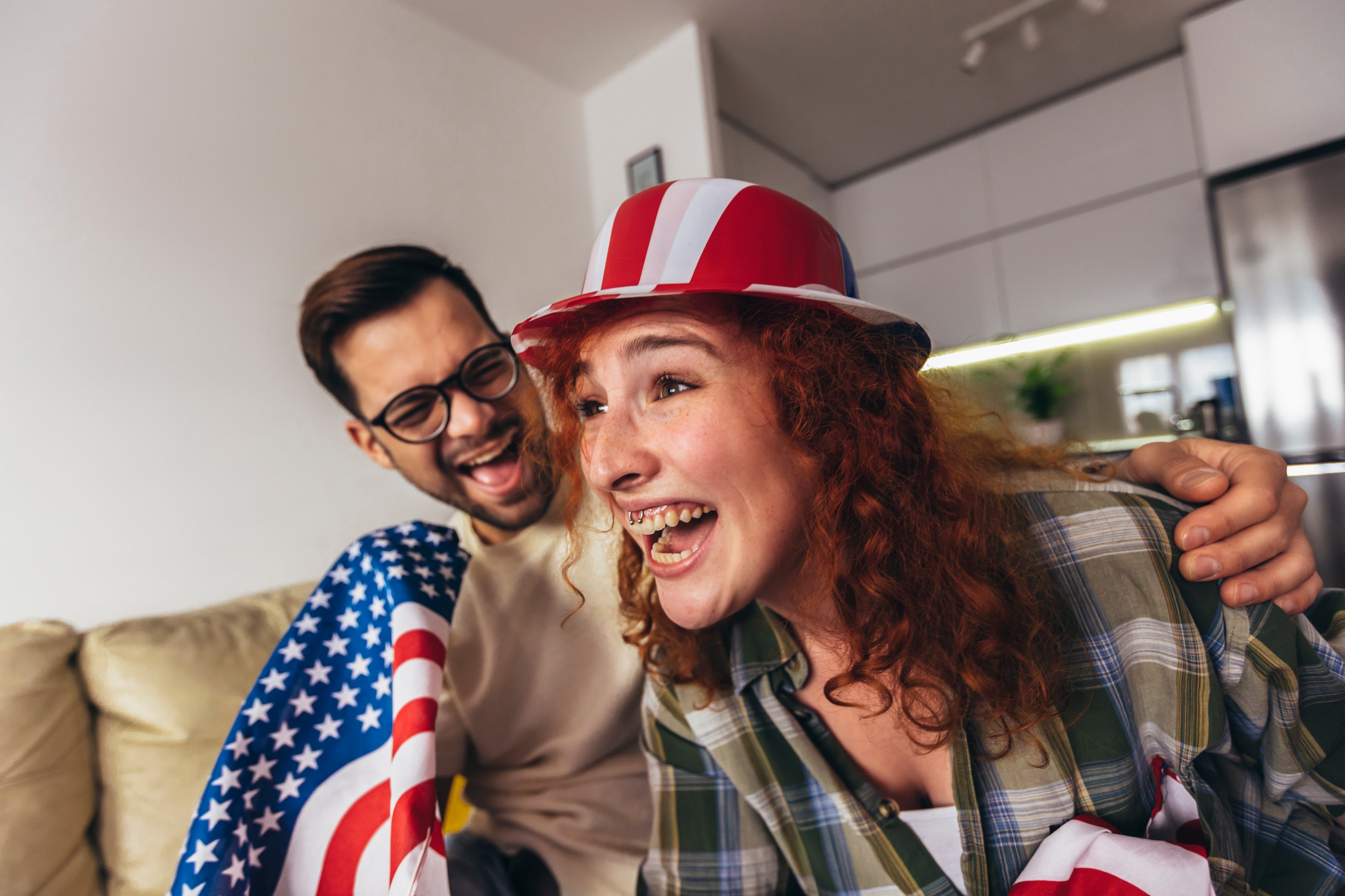 Laughing Super Bowl couple