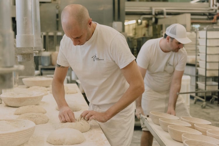 Bread production at Vienna's Joseph Brot, the artisan bakery founded by Josef Weghaupt and recognised for its commitment to organic grains and sustainable baking.