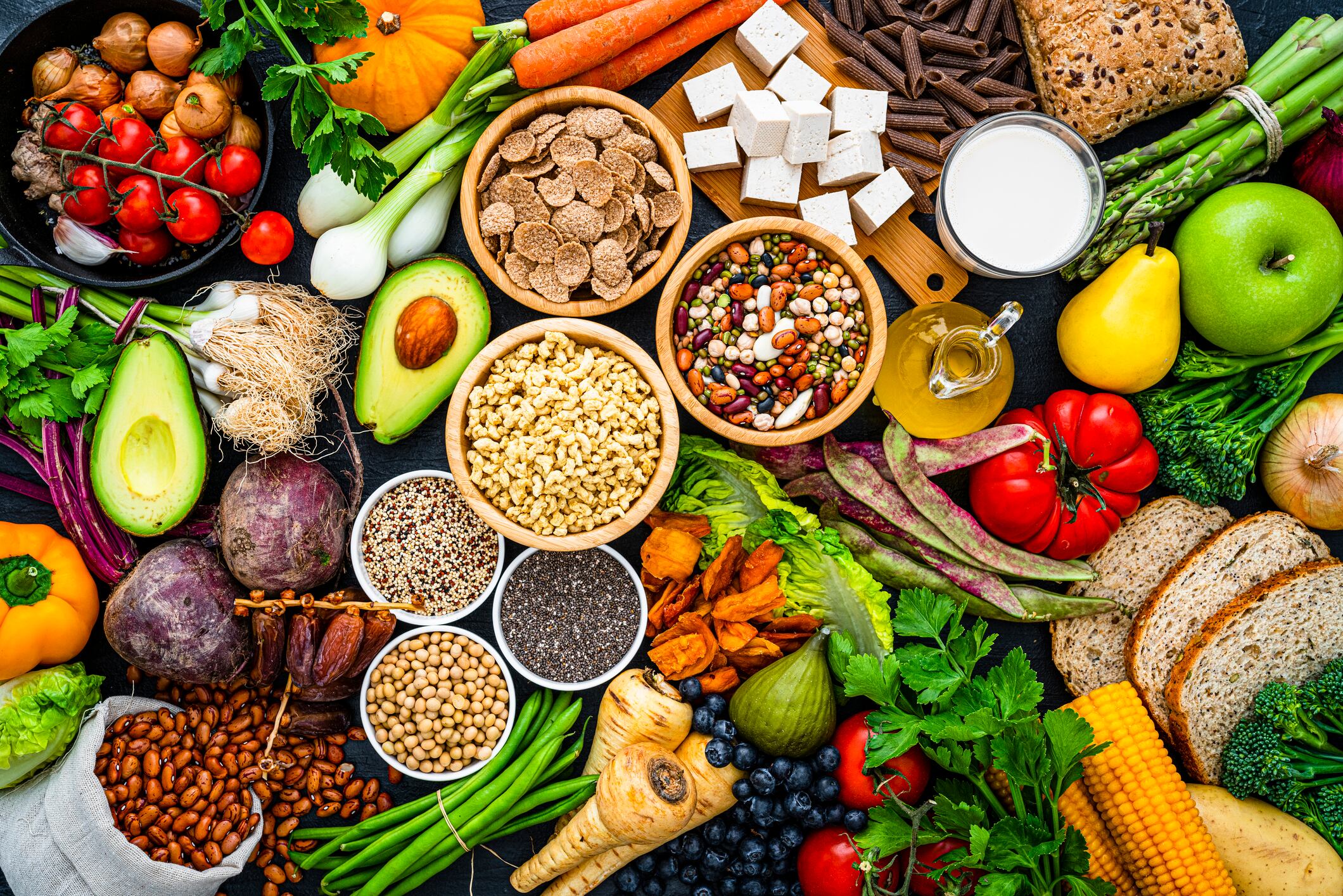 Overhead view of healthy organic fruits, vegetables and soy products.