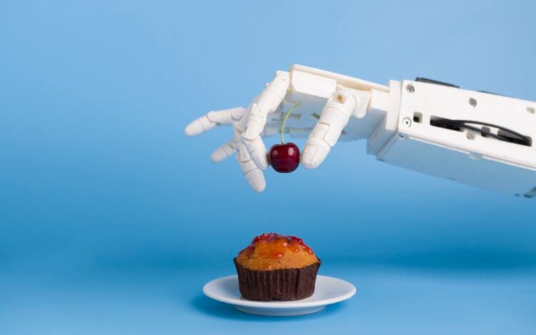 Robot-putting-cherry-on-top-of-cupcake-Getty-ProStock-Studio.jpg