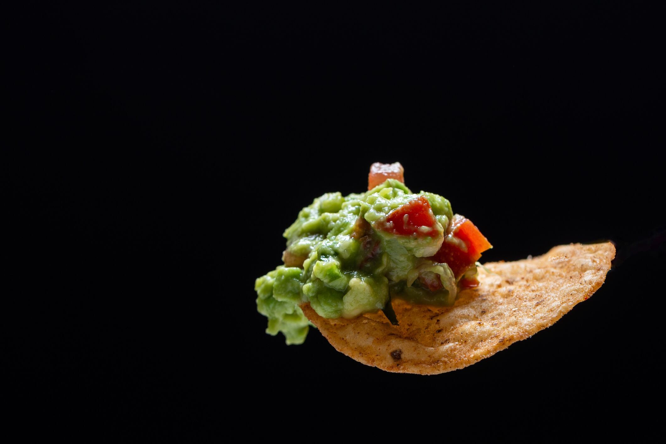 Chunky guacamole on a chip Francisco Romero GettyImages