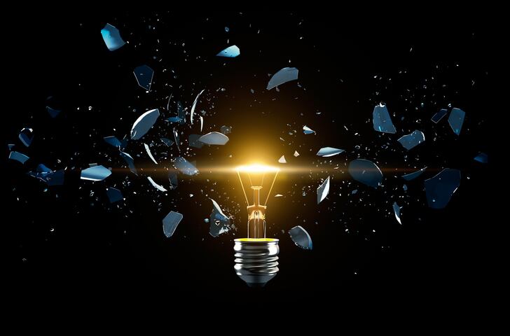 Broken light bulb on a black background - 3D Rendering
