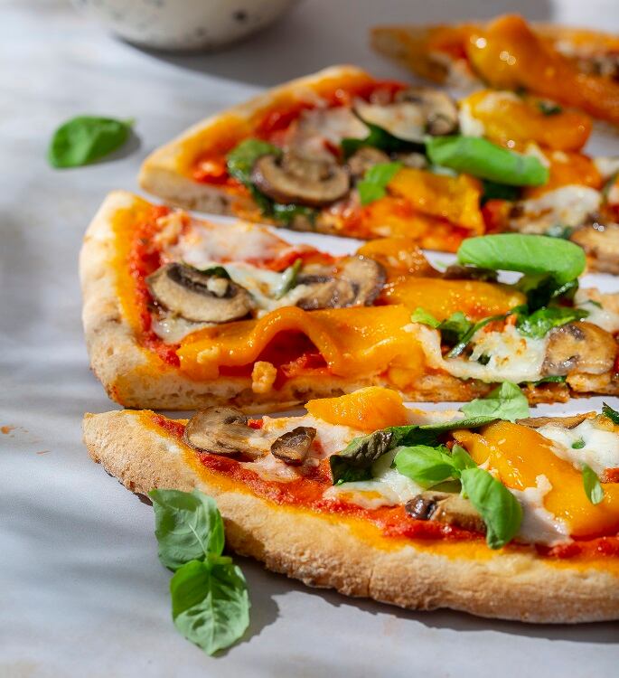CROP-Hi-res-Med-TWRC12-Nudie-Pizza-Base-serv-sugg.-Pizza-base-available-from-Central-Foods.jpg