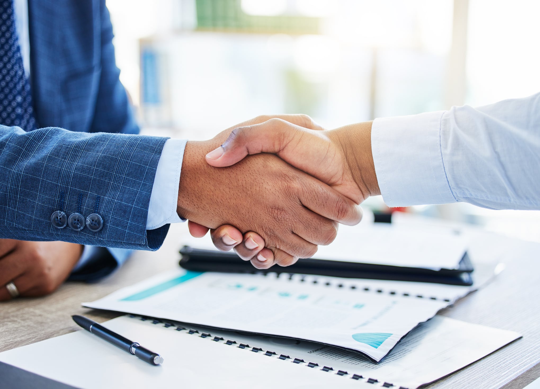 men shaking hands handshak