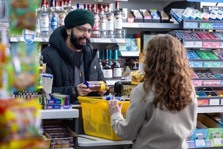 Shopper buy McVitie's digestives at a convenience store