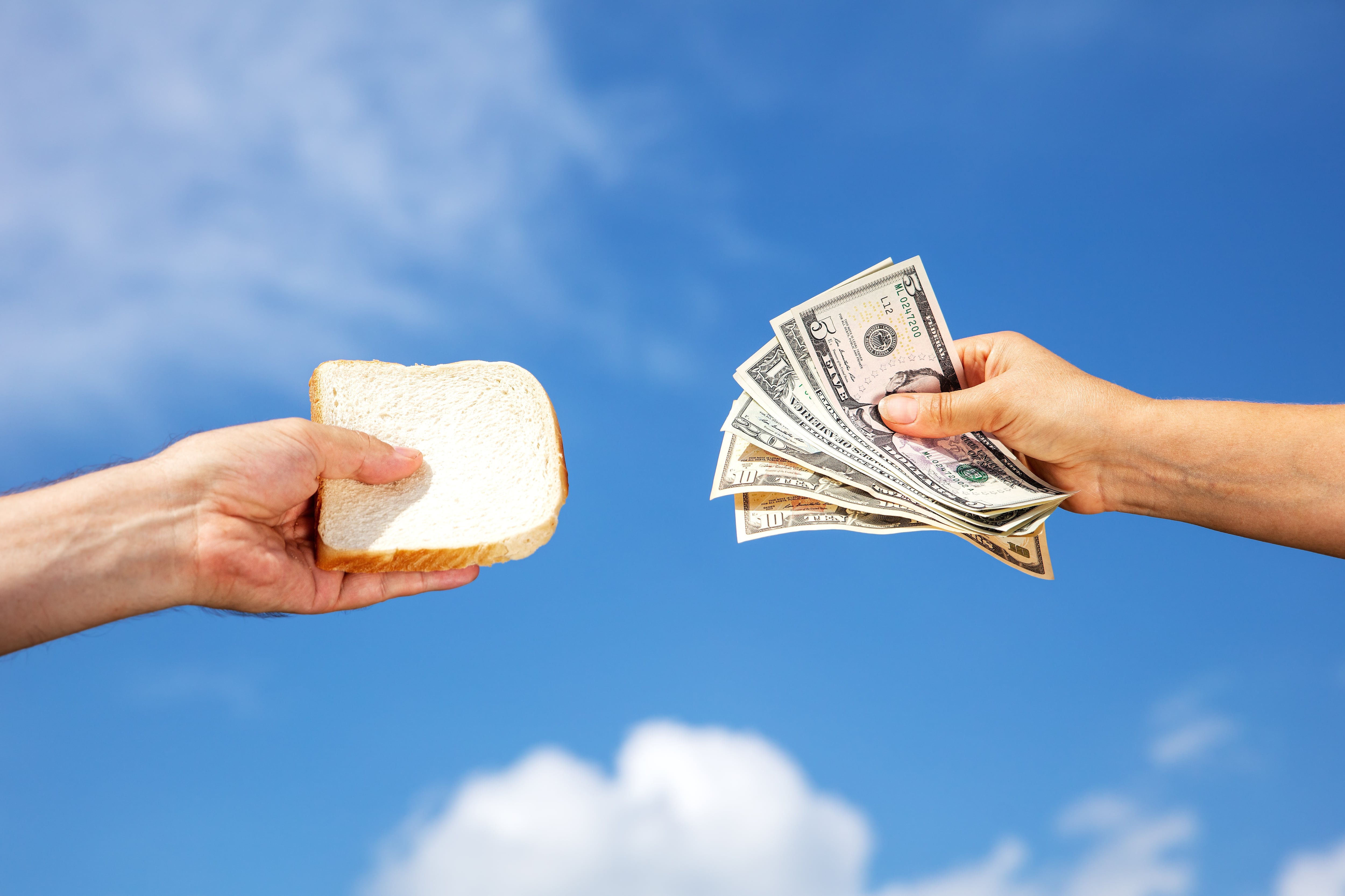 Paying dollars for bread