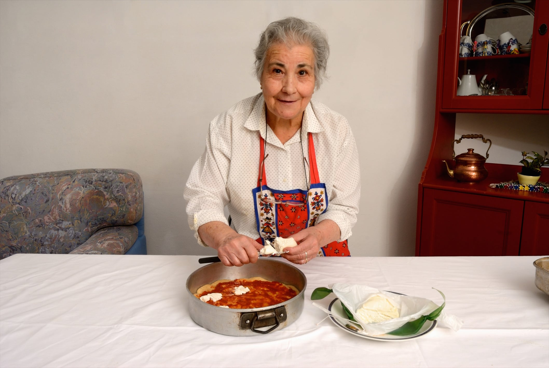 Nonna making pizza