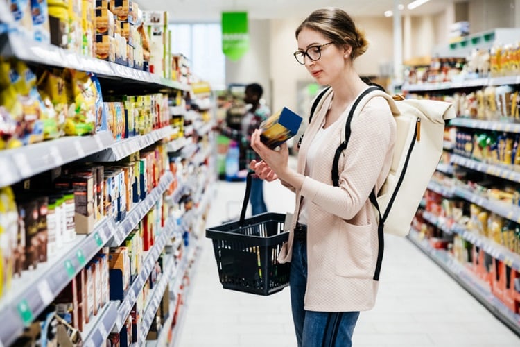 Woman-shopping-looking-at-label-Getty.jpg