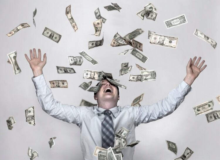 Throwing-up-money-in-the-air-Getty-Jonathan-Kitchen.jpg