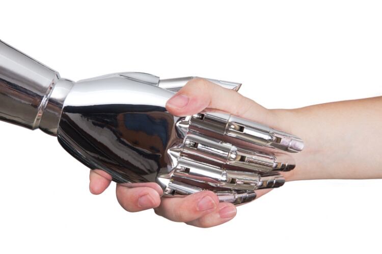 Shaking-a-robots-hand-GettyImages-zhuyufang.jpg