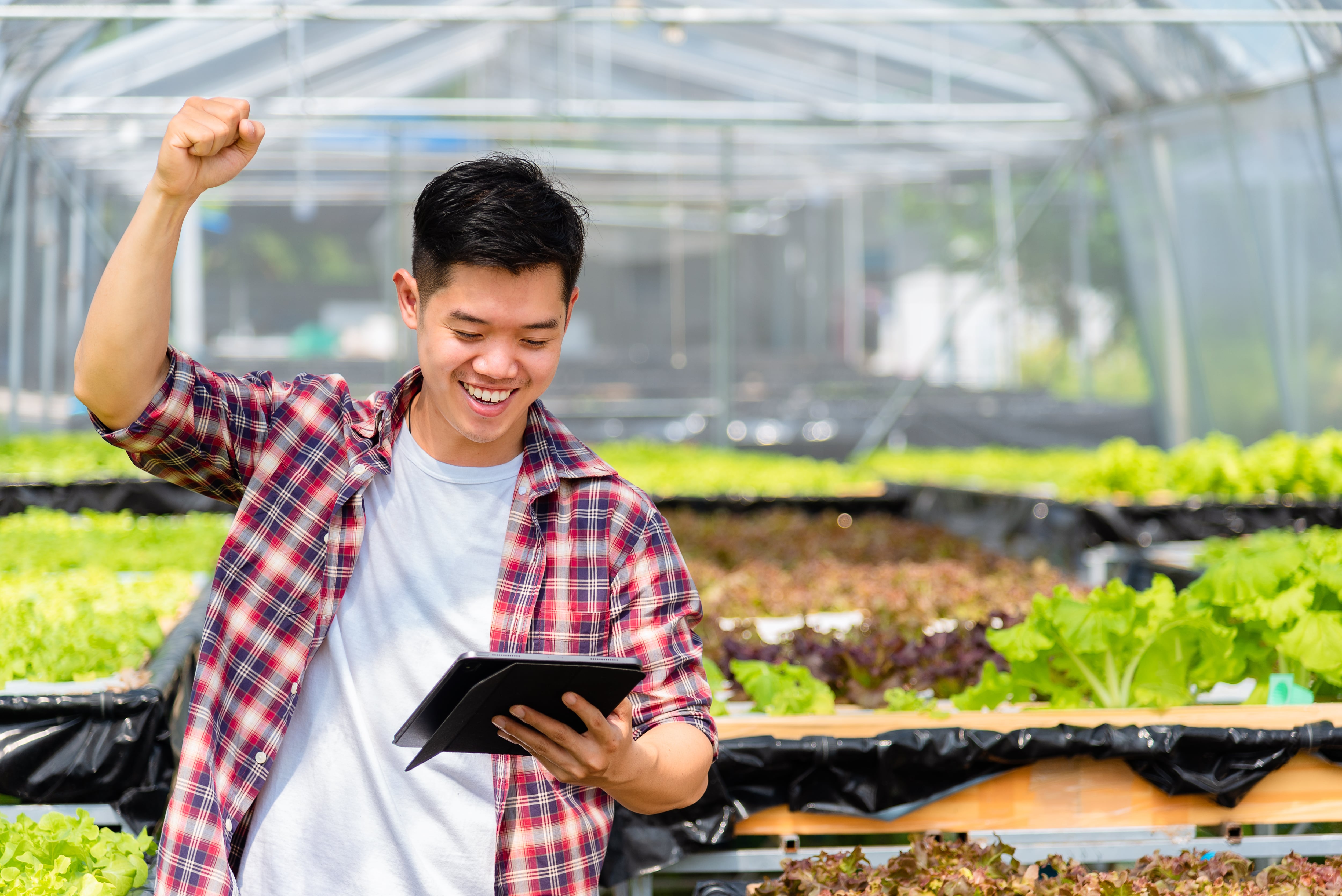 Small business owner expressing joy over a successful pitch