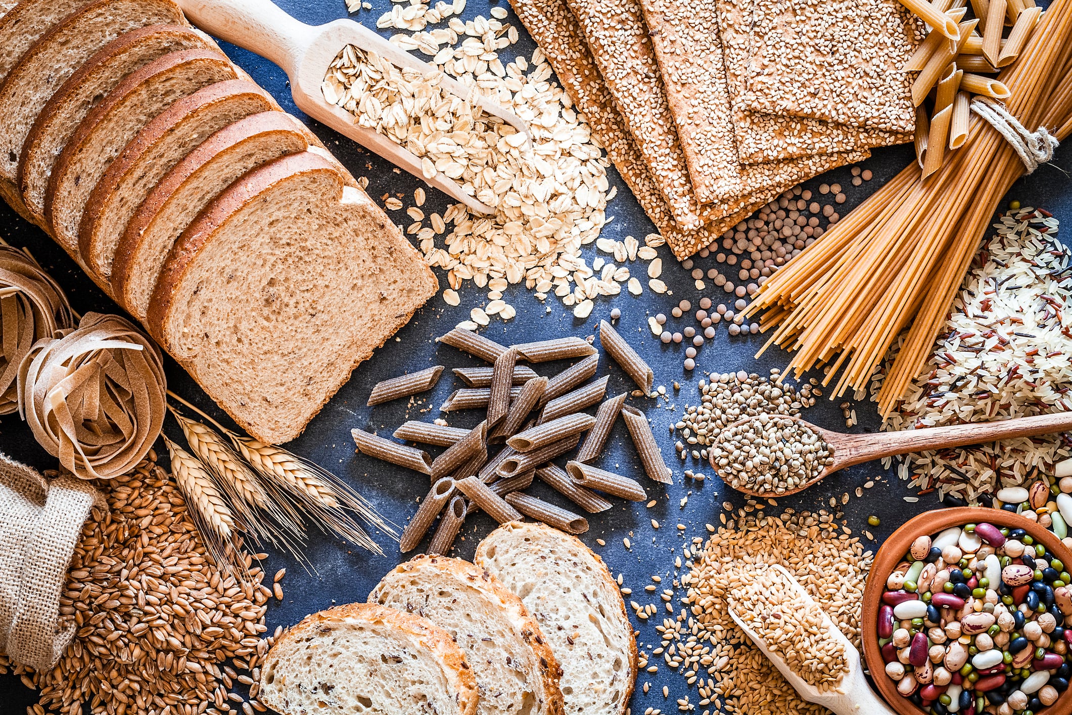 Top view of wholegrain and cereal composition shot on rustic wooden table.