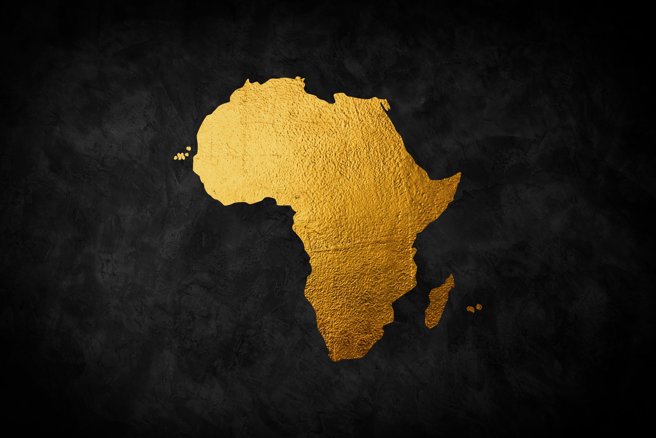 Golden sign Africa continent. Gold maps or symbols. Isolated textured golden logo on dark background.