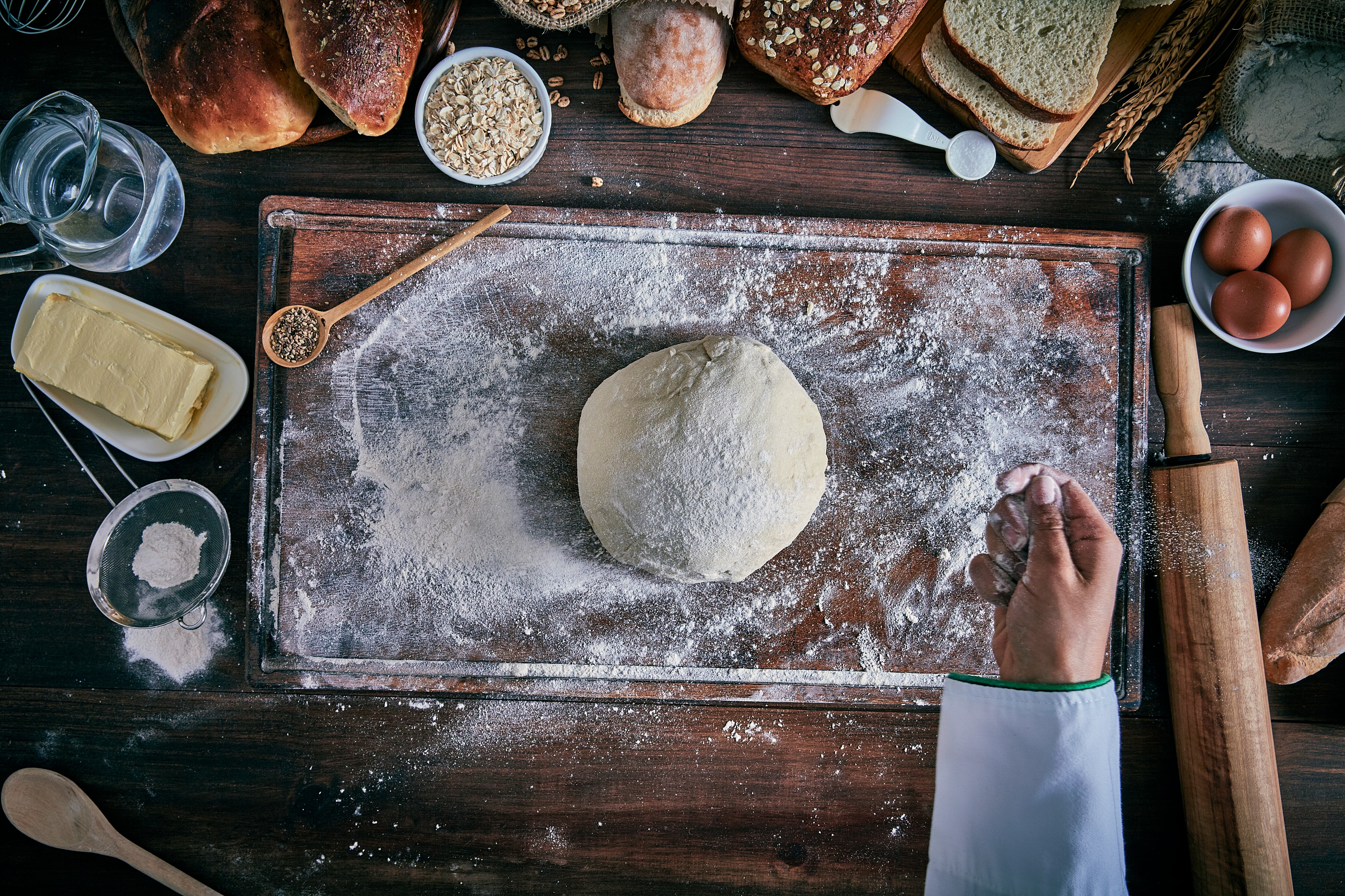 Chef kneading dough
