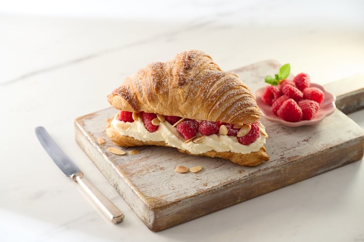 Cream & Raspberries French Butter Croissant On A Wooden Board