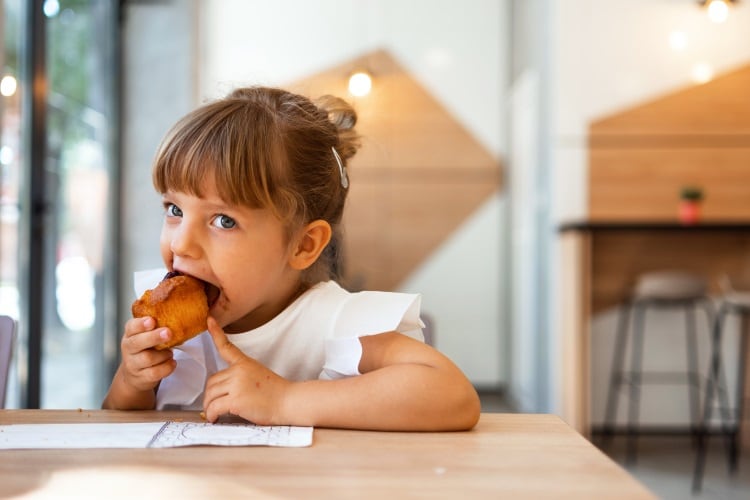 Eating-a-pastry-Georgijevec.jpg