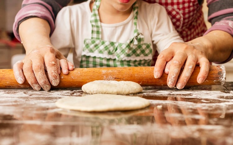 Granny-and-granddaughter-rolling-dough-GettyImages-627931438.jpg