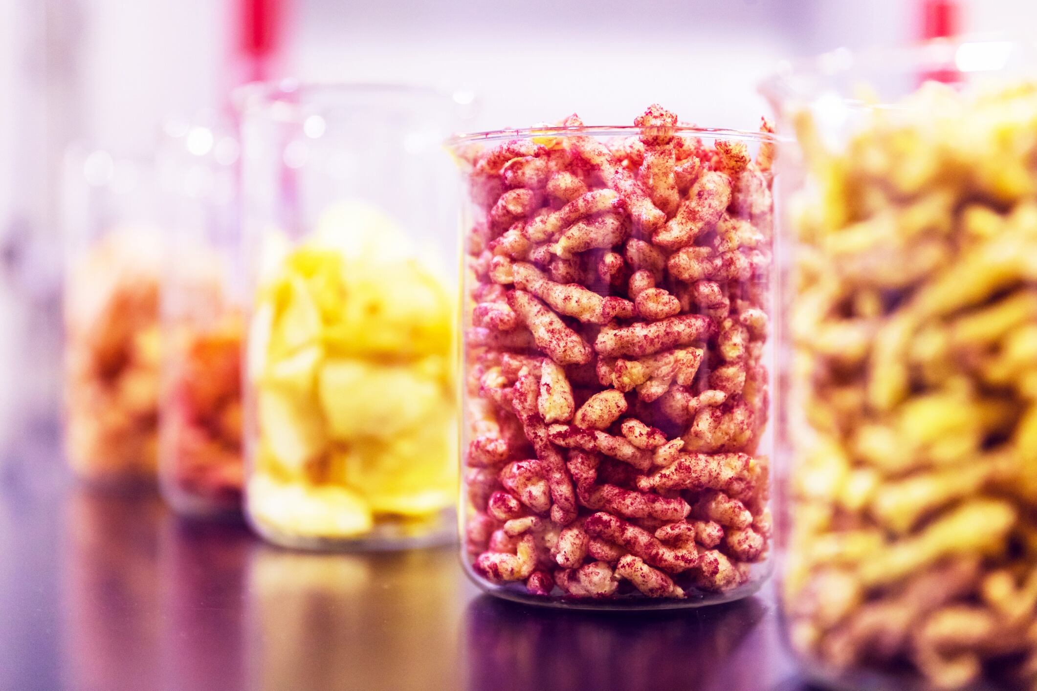 Jars filled with Savory Crunchy Snacks Arrived in the Lab for Quality Inspection
