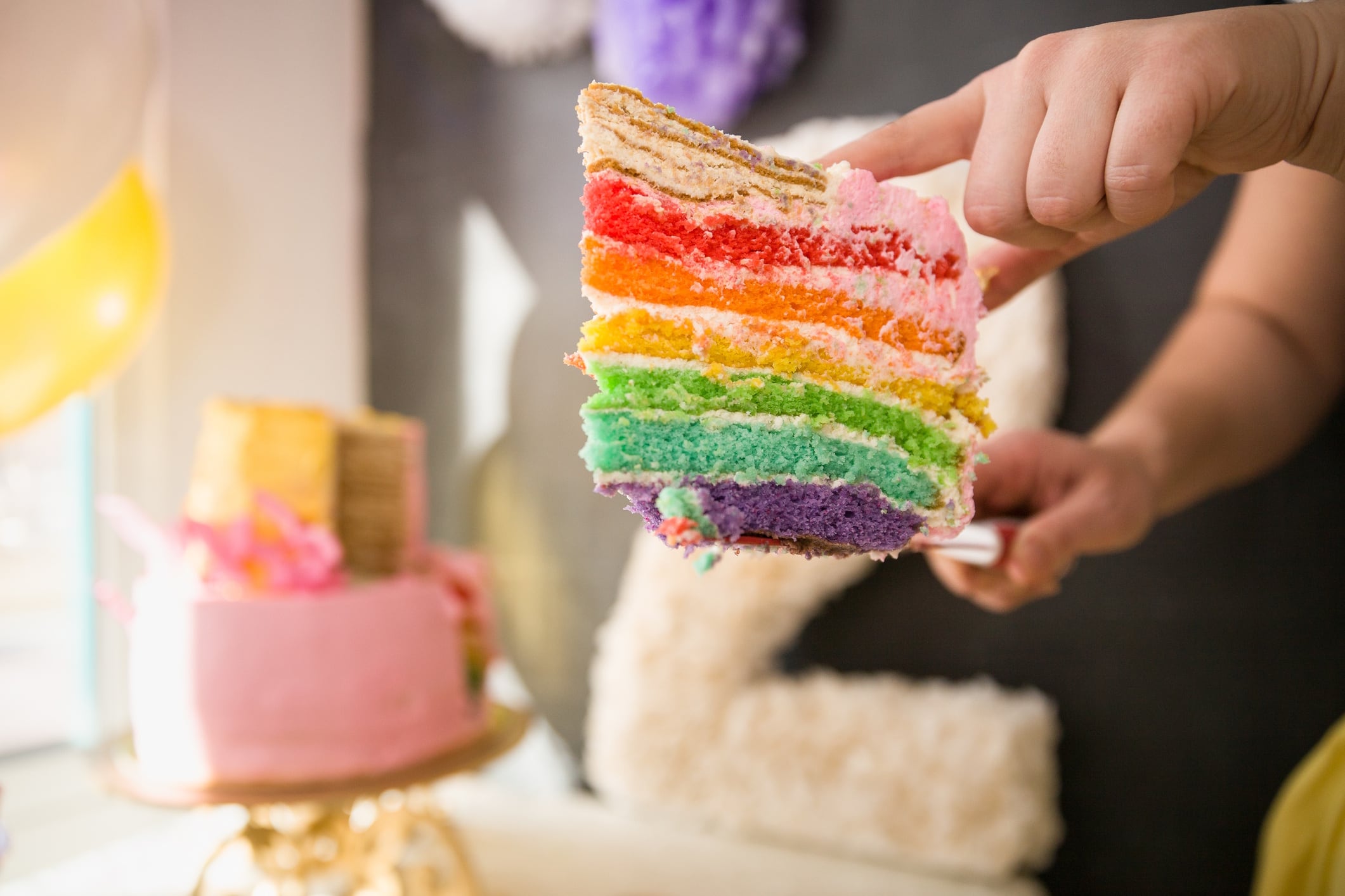 Slice of rainbow cake