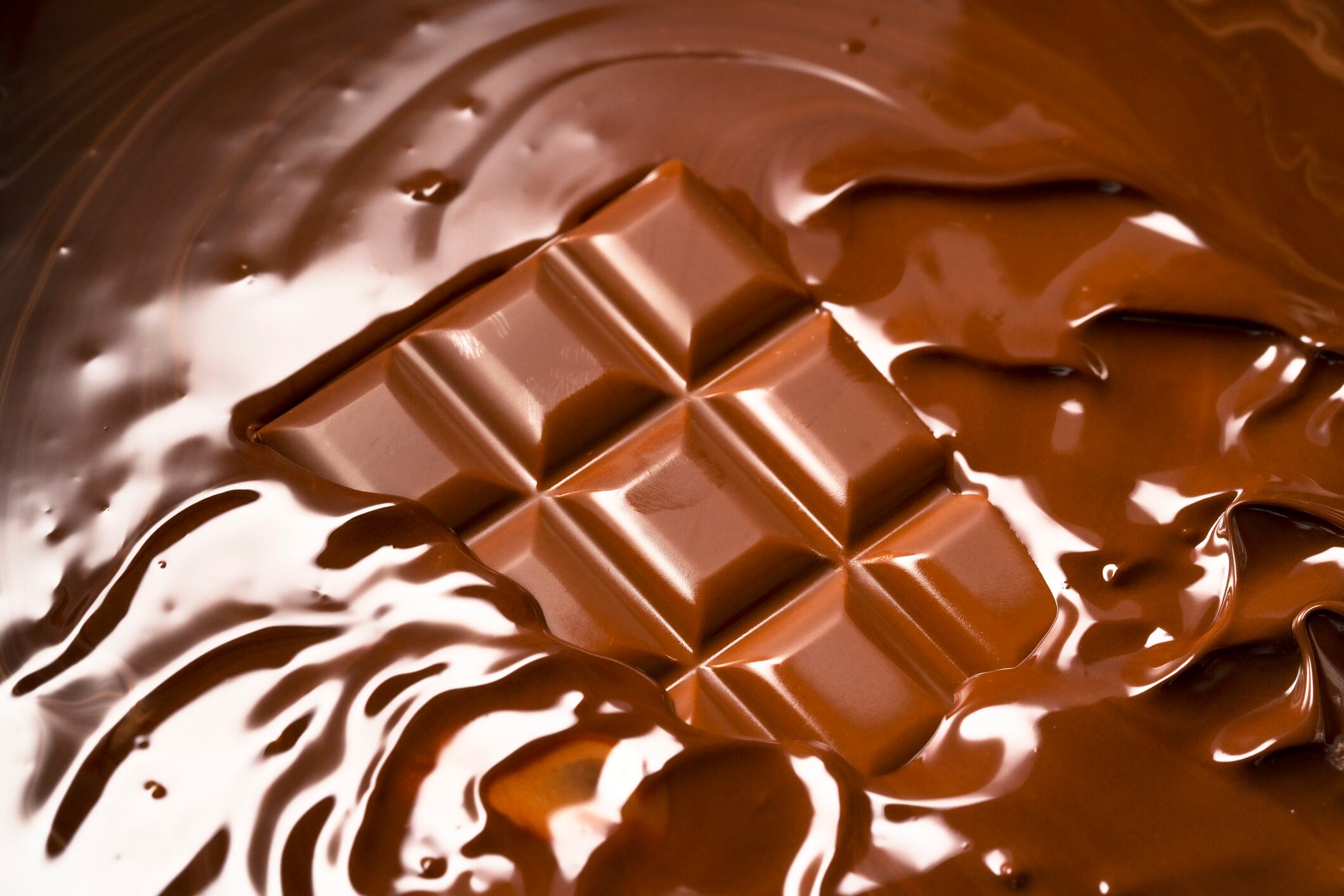 Melting chocolate bar. Chocolate sauce.