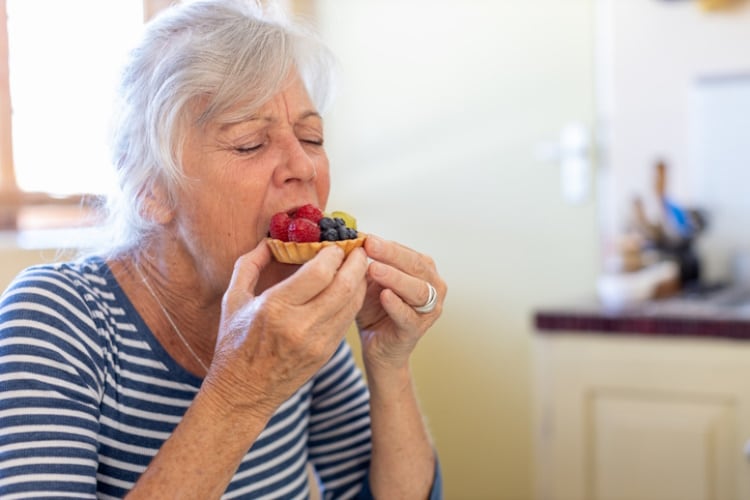 Old-woman-South-Africa-eating-fruit-tart-nostalgia-Getty-Alistair-Berg.jpg