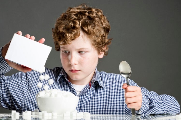 Kid eating sugar for breakfast
