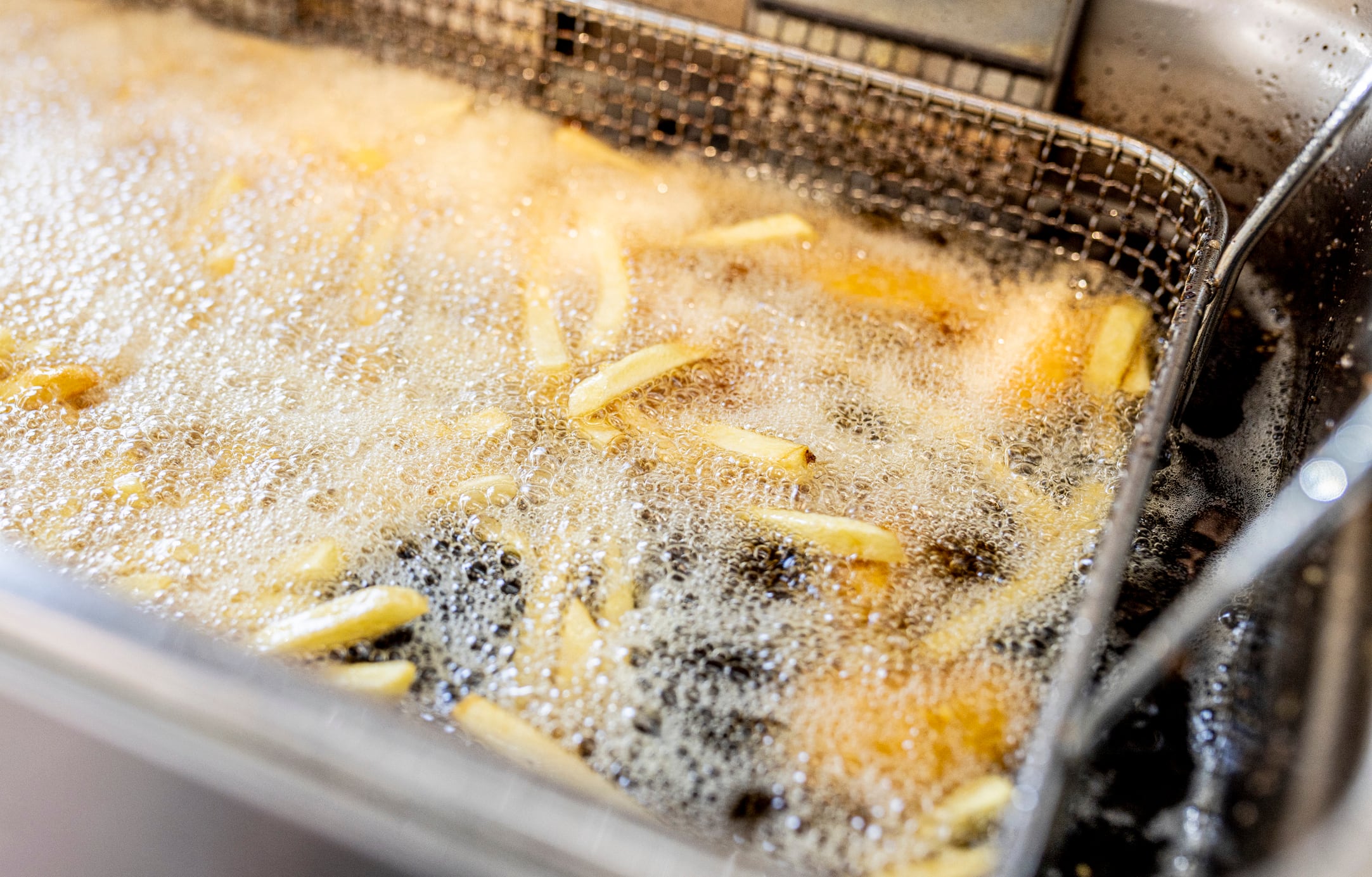 Fries in a fryer