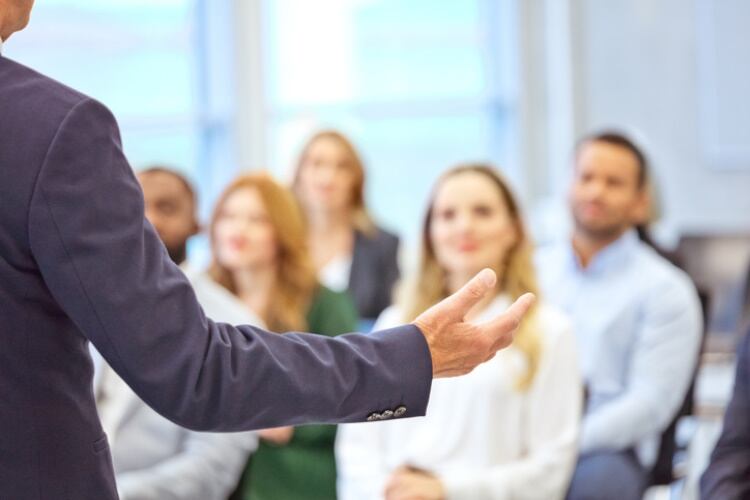 Business-conference-presenting-GettyImages-izusek.jpg