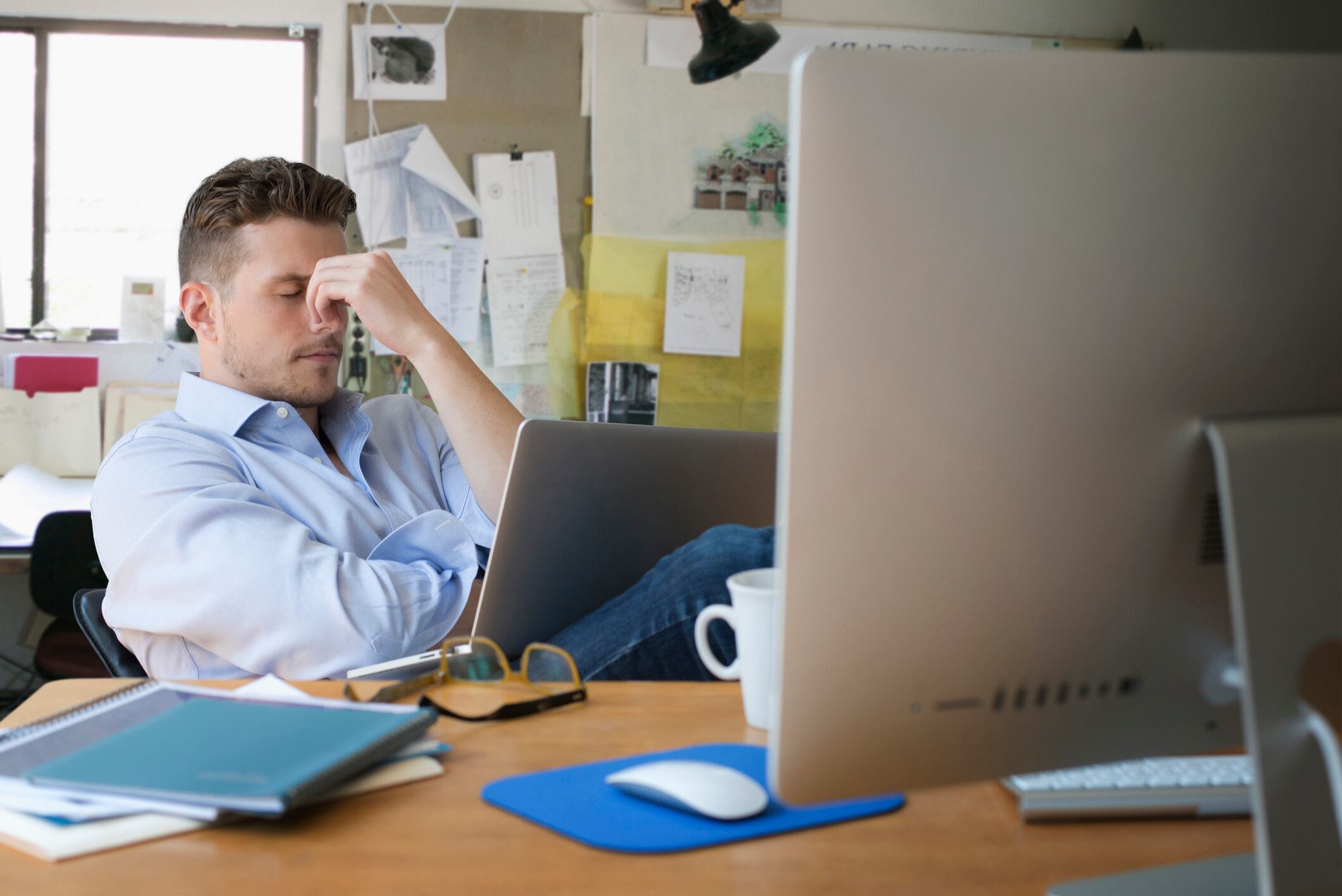Man with his head in his hands