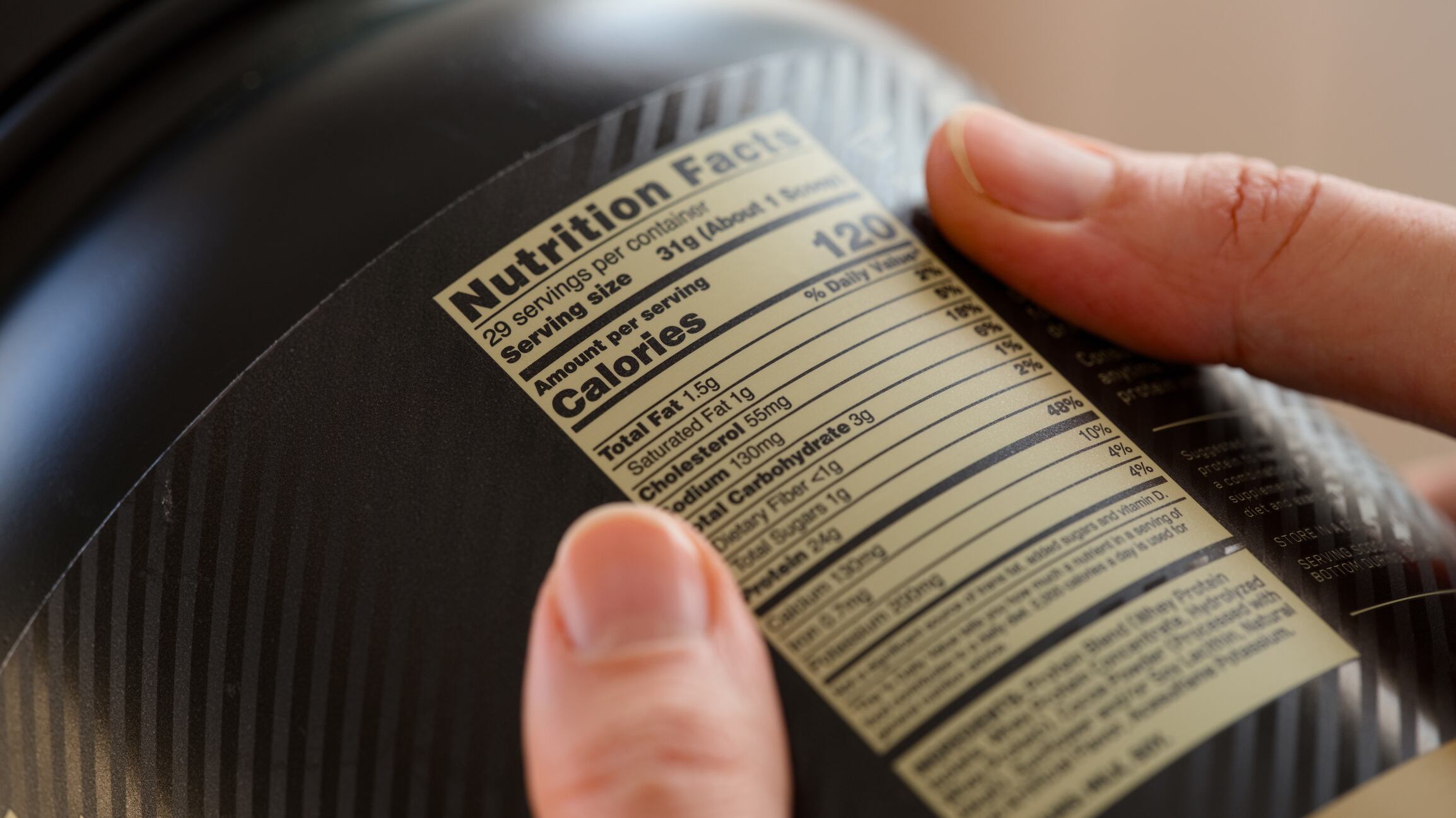 Person reading label
