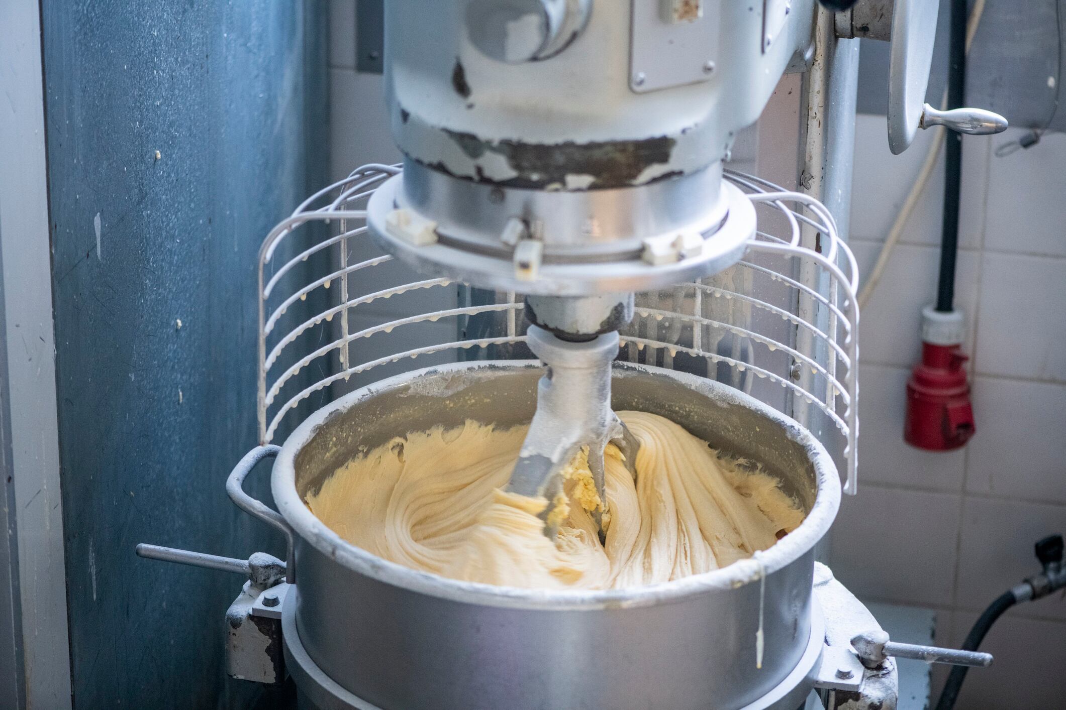 Industrial mixer mixing cake batter