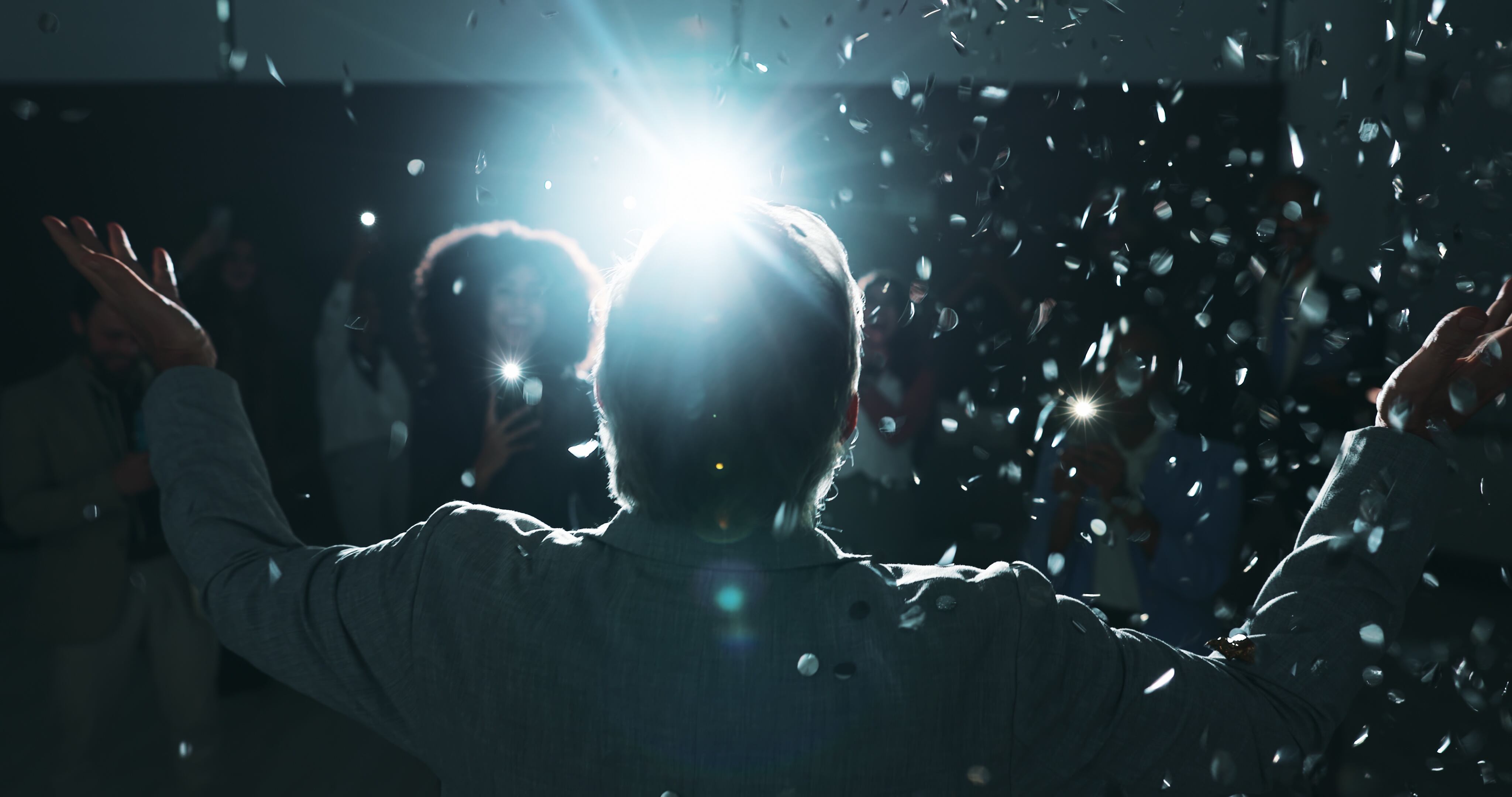 Success, confetti and award with business people at conference for winner, wow and pitch support. Achievement, congratulations and cheering with employee at summit for celebration, praise and team Jacob Wackerhausen GettyImages