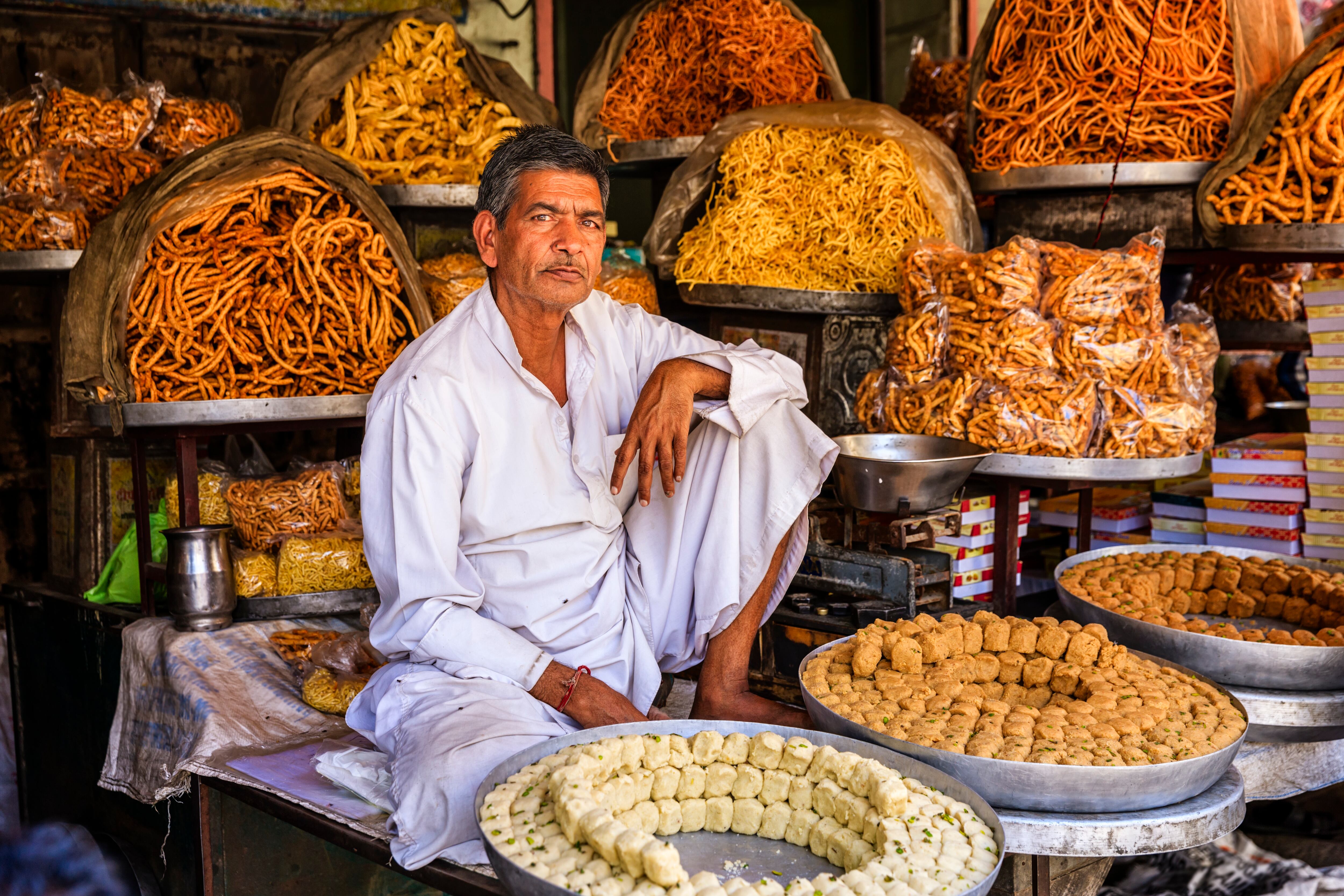 Indian street selling selling namkeen and sweets