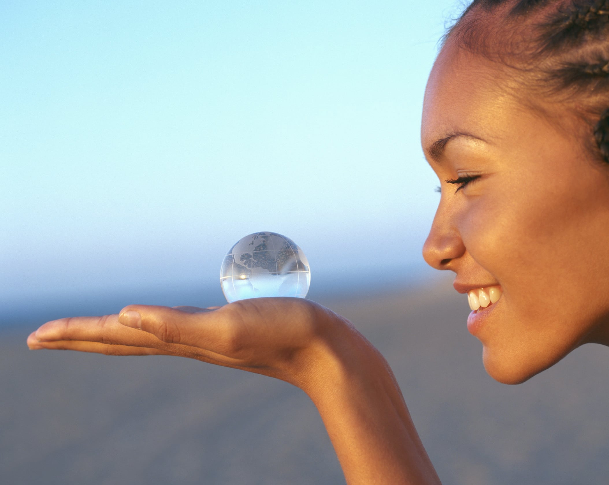 Woman-Crystal-World-Ball-In-Hand.jpg