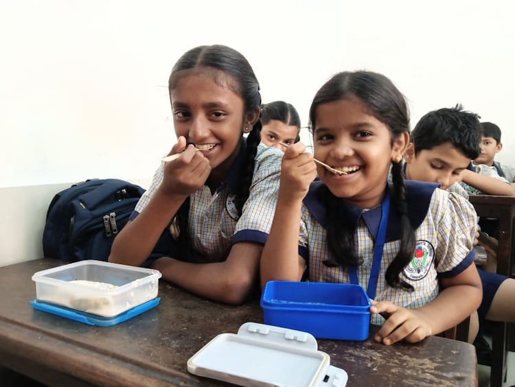 Quaker Children consuming QBOG Product in field
