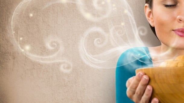 Woman using all her senses to appreciate food