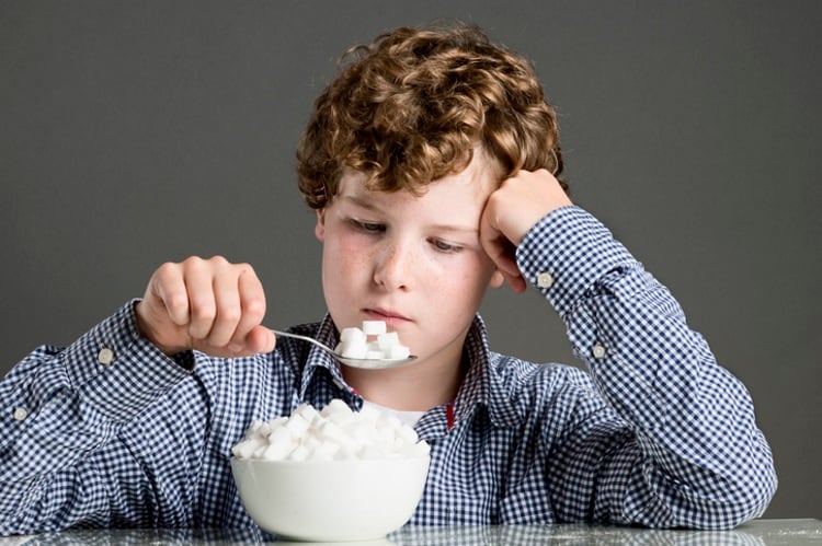 Youngster-eating-bowl-of-sugar-ClarkandCompany.jpg