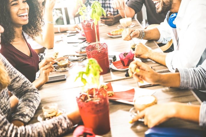 GettyImages-ViewApart-young-people-eating-table.jpg