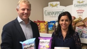 Kettle Foods managing director Ashley Hicks with Cornpoppers' previous owner, Balvinder Nijjar. Picture Kettle Foods.