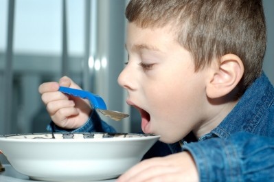 Children view nearly 2 RTE cereal ads each day, 87% of which promote high-sugar products, researchers say