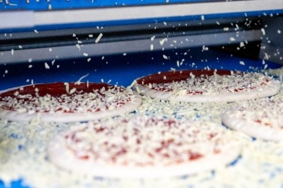 AMF's digital system will optimise the quality and quantity of cheese on a pizza. Pic: AMF Bakery Systems