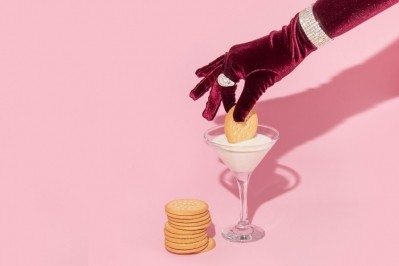 Cash-strapped consumers are creating new occasions and moments, with 29% serving up snacks at a stay in with friends rather than going out. Pic: GettyImages/Adela Belovodjanin