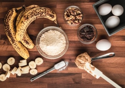 Ingredients for Paleo grain and sugar free banana bread with walnuts and dark cocoa. Pic: GettyImages/connerscott1