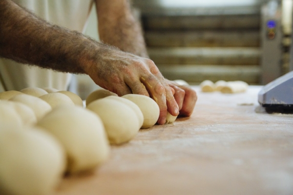 baker making rolls